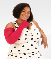 woman posing with red flat knit upper extremity juzo product
